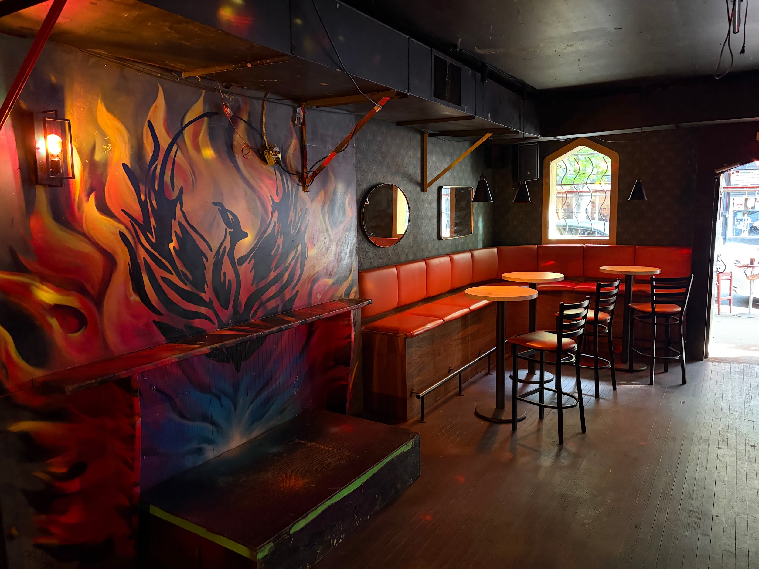 Tables and wall details inside Phoenix.